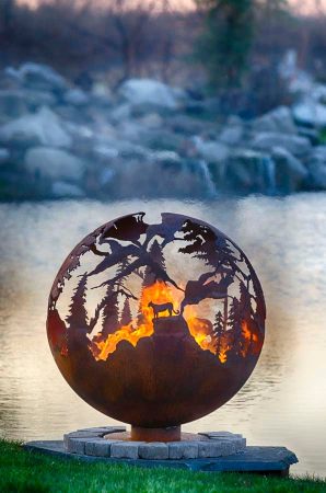 A metal sphere with a fire burning inside it.